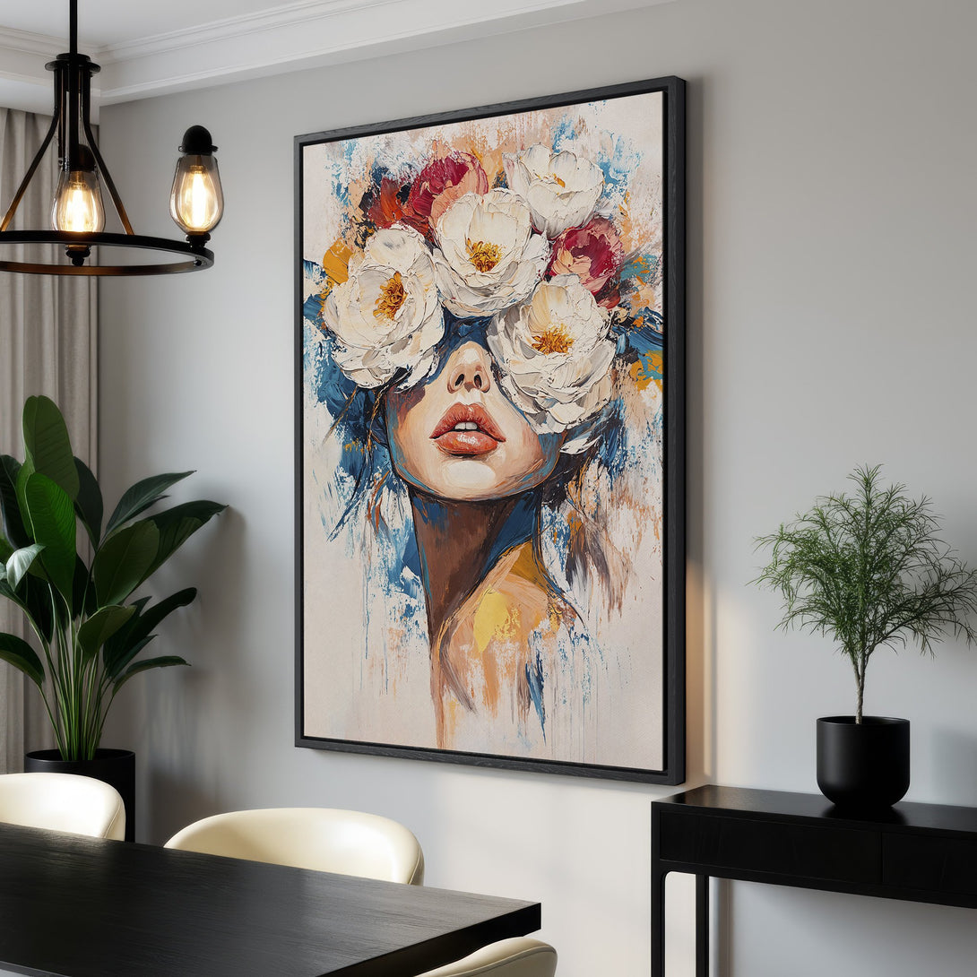Framed Wall Art: Abstract floral portrait in a modern interior. Features a woman's face covered in white flowers, with a vibrant blue, red, and yellow palette.