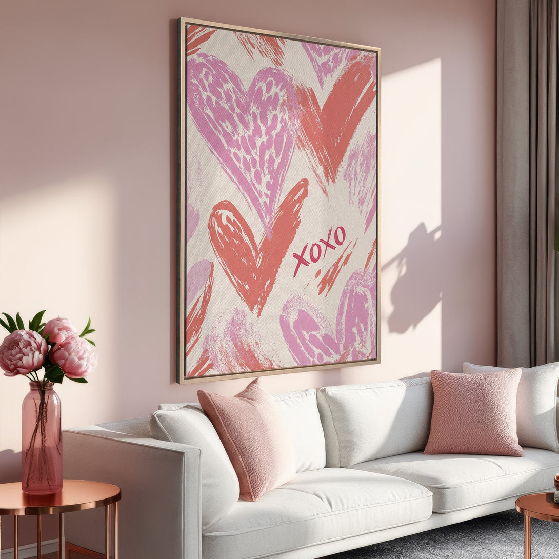 Framed Wall Art featuring abstract hearts in pink and coral hues. Perfect for adding a touch of love to your home decor. Shop now!