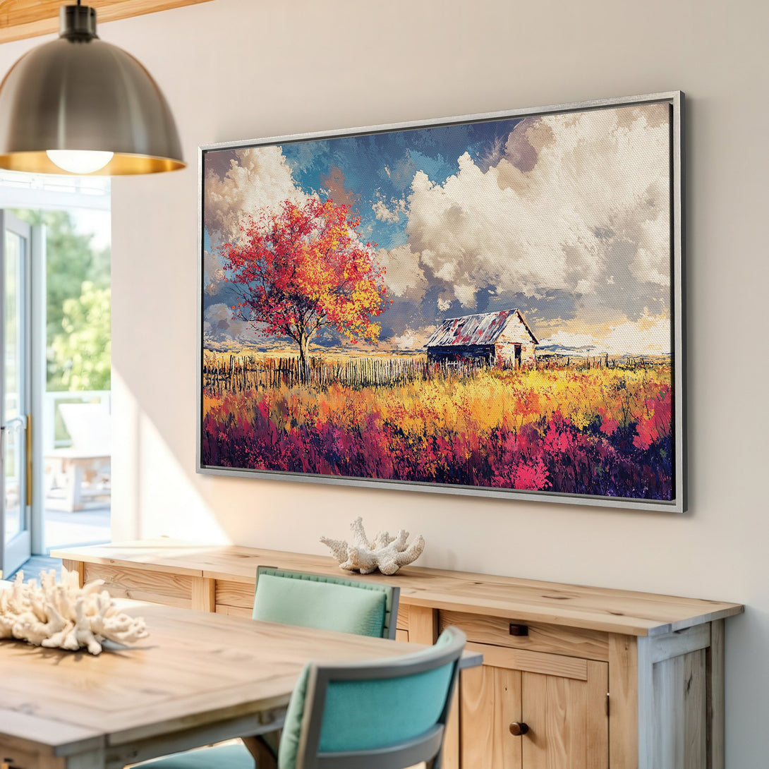 Framed Wall Art: Rustic landscape Canvas Print with vibrant fall colors. Featuring a barn, tree, and colorful field. Perfect for adding warmth to your home!