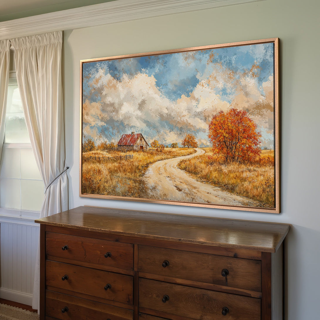 Framed Wall Art: Rustic landscape Canvas Print with warm autumn colors. Features a barn, road, and trees in a painterly style. Perfect for cozy interiors.
