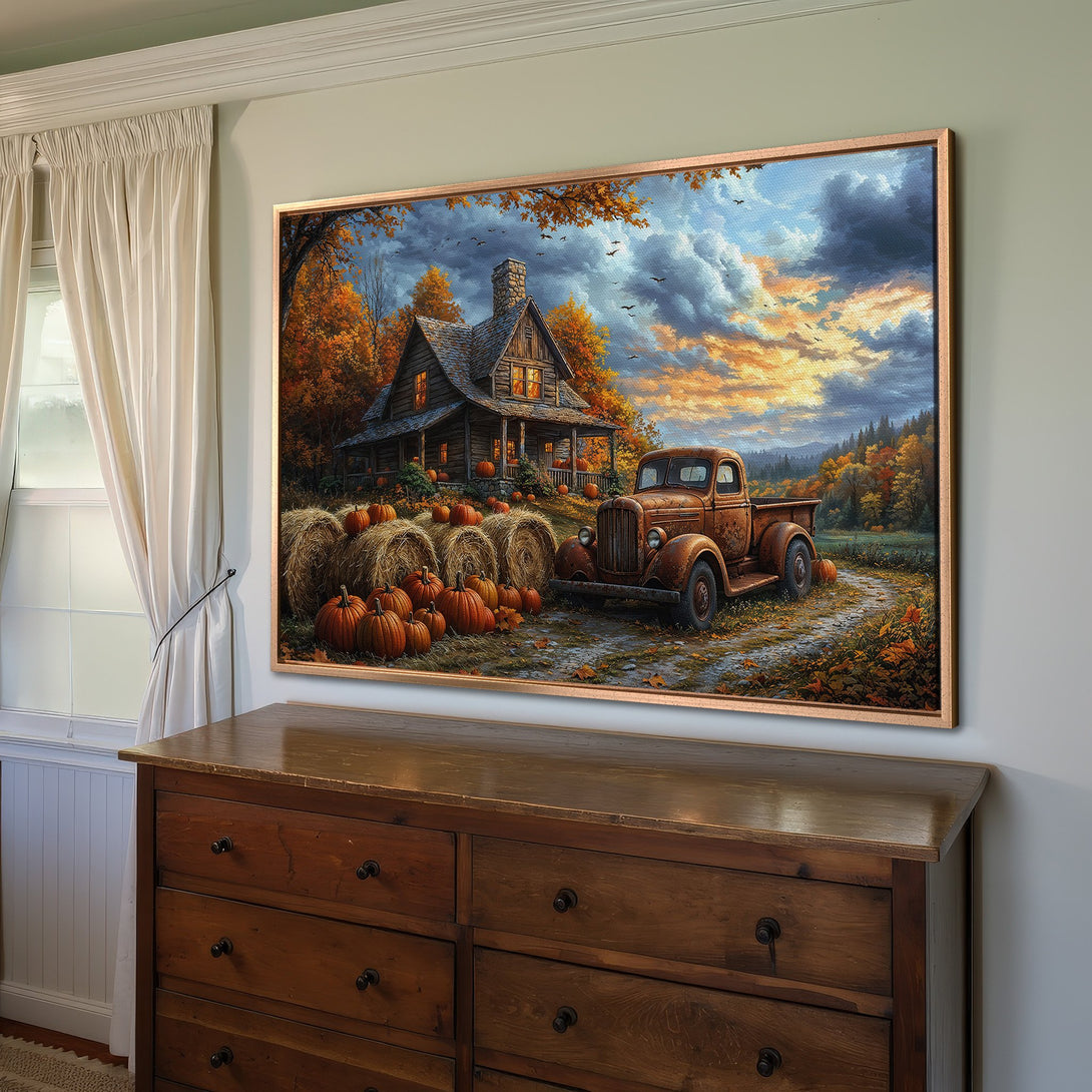 Framed Wall Art: Rustic autumn scene with cabin, truck, and pumpkins. Warm orange, brown, and blue color palette. Perfect for fall decor.