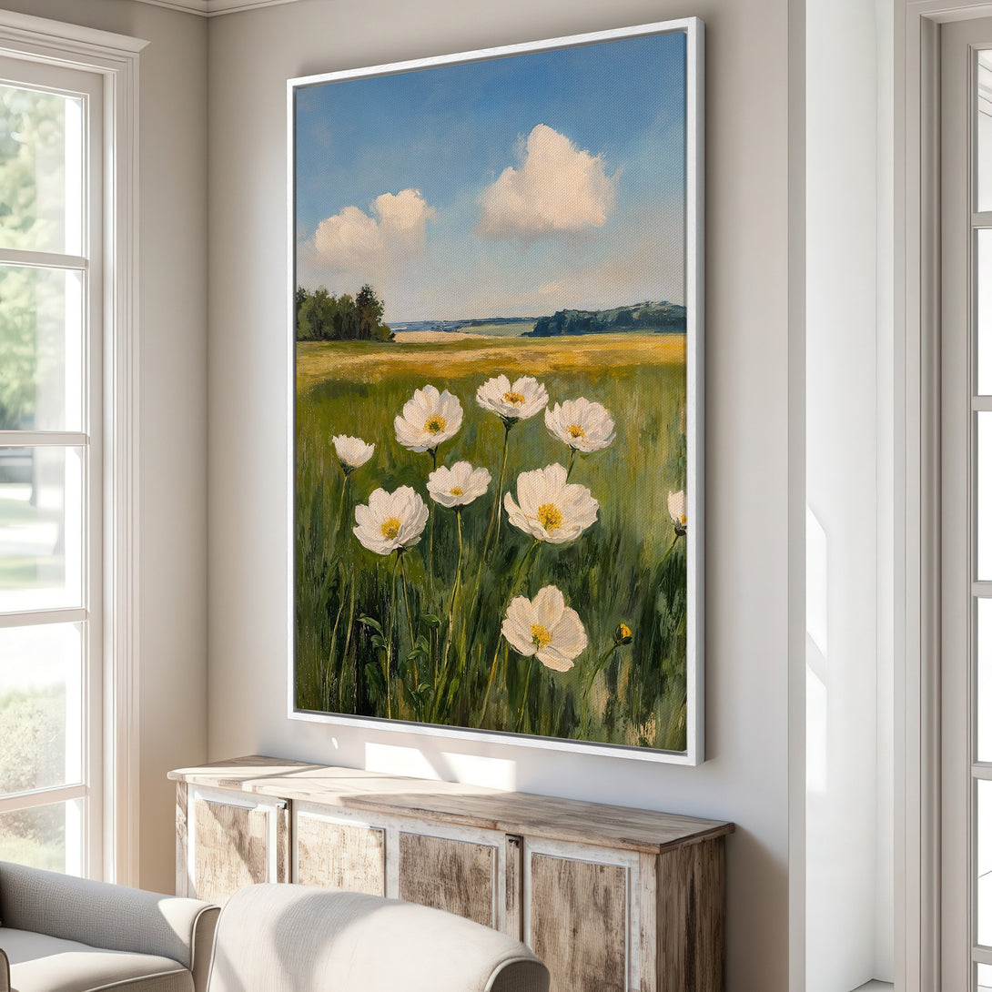 Framed Wall Art: Impressionistic field of white flowers under a blue sky. Green, yellow, and white color palette. Perfect for adding a touch of nature.