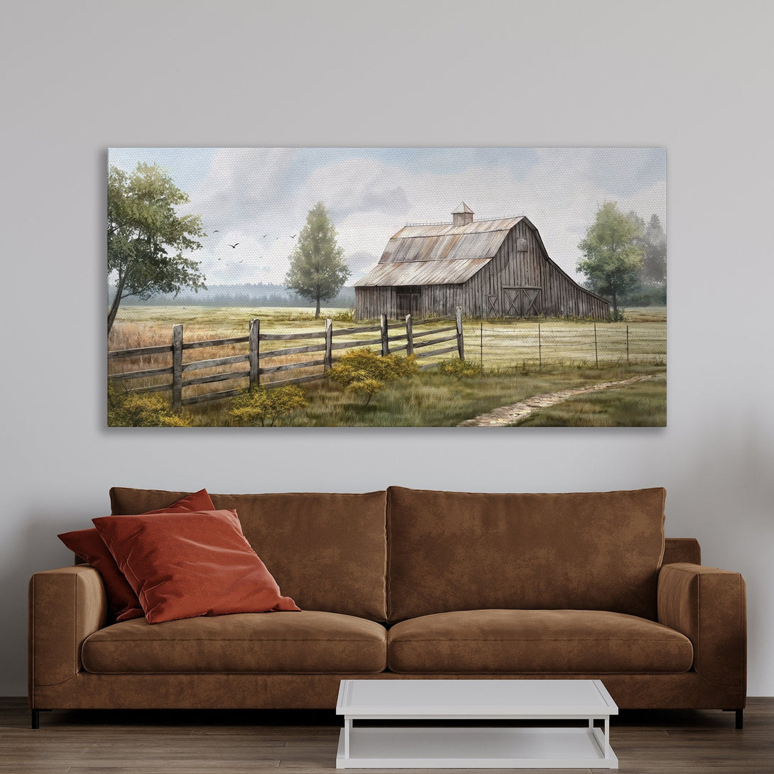 Framed Wall Art featuring a rustic barn scene in a watercolor style. Earthy tones of brown, green, and gold create a warm, inviting aesthetic. Perfect for farmhouse decor.