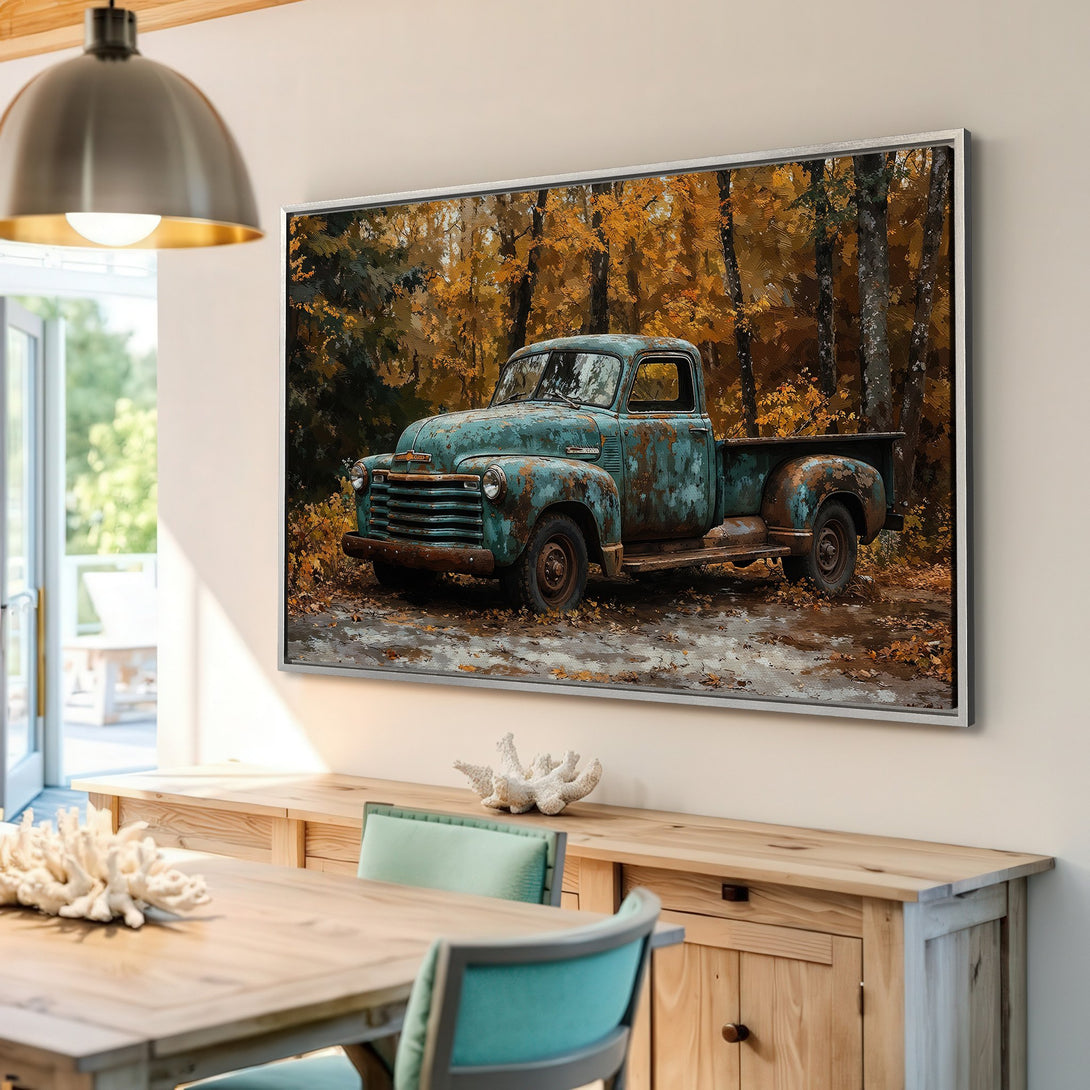 Framed Wall Art: Vintage teal truck in autumn forest. Rustic style canvas print with warm earth tones for cozy home decor.
