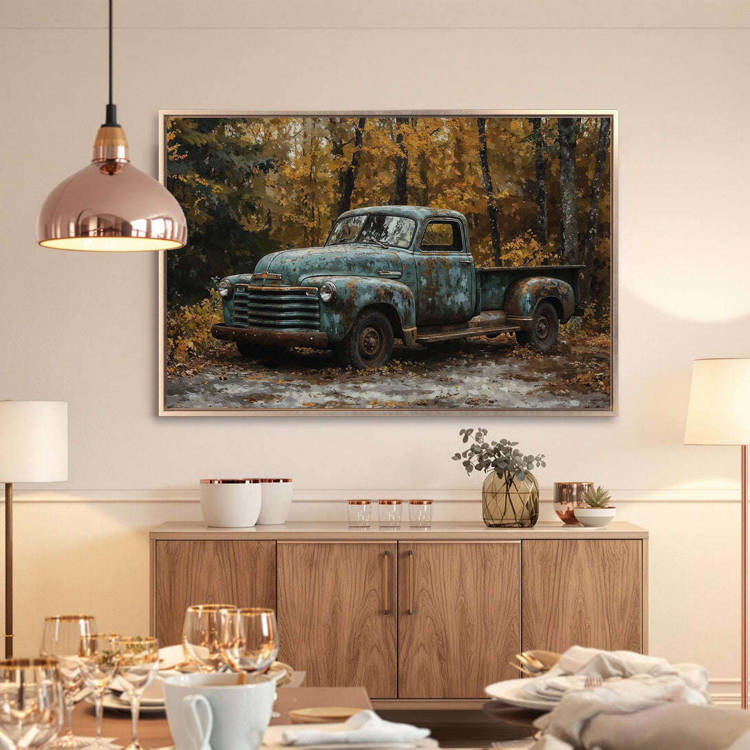 Framed Wall Art featuring a vintage truck in a forest scene. Warm autumn color palette of teal, brown, and gold. Perfect for rustic decor.