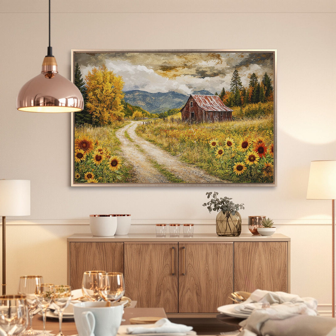 Framed Wall Art: Rustic barn scene canvas print with sunflowers, warm yellow & brown tones. Perfect farmhouse decor for living room or dining area.