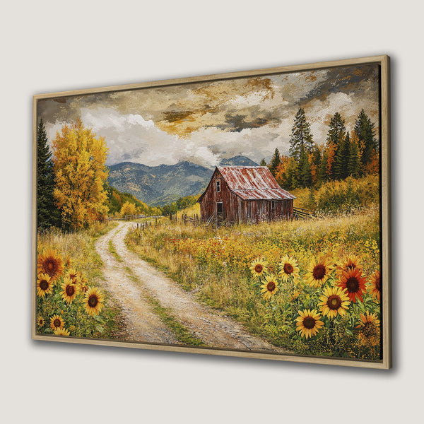 Framed Wall Art: Rustic landscape Canvas Print featuring a barn, sunflowers, and a dirt road. Warm, autumnal color palette for cozy home decor.