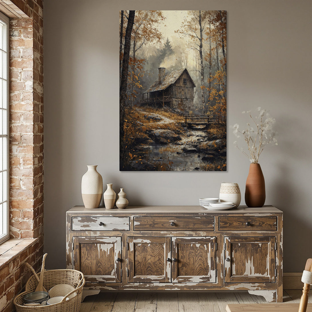 Framed Wall Art: Rustic cabin scene canvas print in warm autumn tones. Perfect for adding cozy, nature-inspired decor to your dining room.