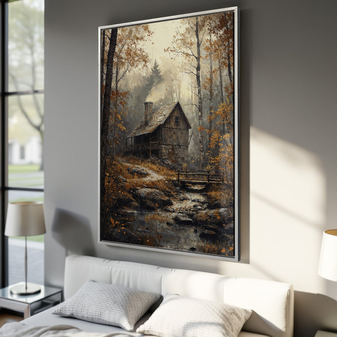 Framed Wall Art of a rustic cabin in a forest, warm autumn color palette. Perfect for adding a cozy touch to your home decor.
