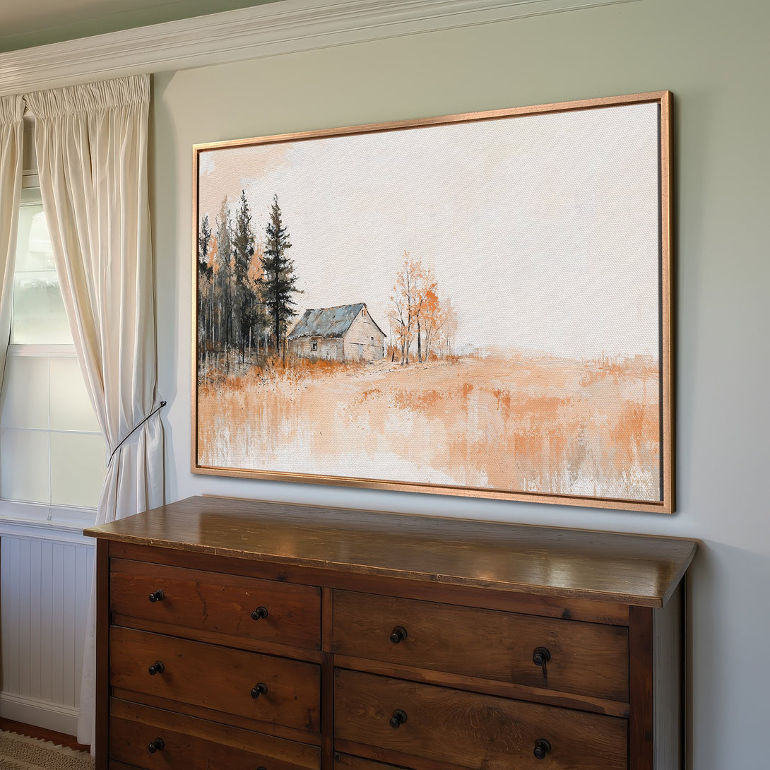 Framed Wall Art featuring a rustic barn scene in warm orange and neutral tones. Perfect for adding a touch of cozy farmhouse style to your home!