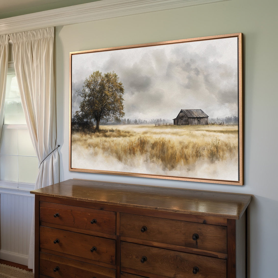 Framed Wall Art: Rustic barn landscape Canvas Print. Warm, neutral color palette with a touch of gold. Perfect for farmhouse decor.
