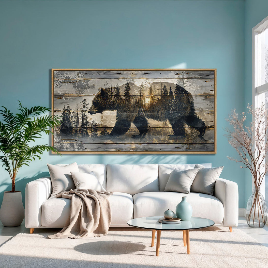 Framed Wall Art: Grizzly bear silhouette on rustic wood-look canvas. Earthy tones with a touch of blue, perfect for adding a touch of nature to your home.