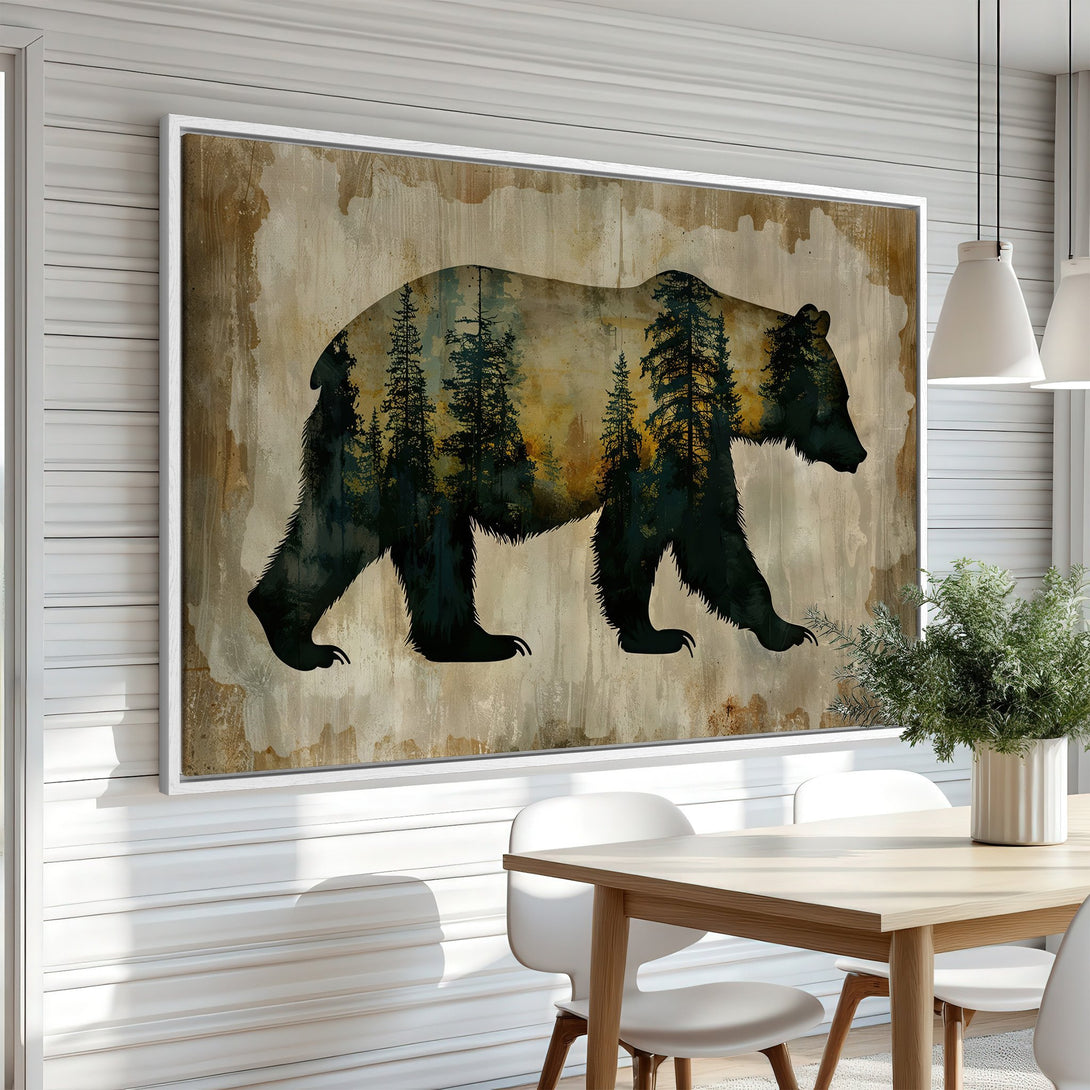 Framed Wall Art: Silhouette of a bear with forest scene, rustic style. Earthy tones of brown, green, and gold. Perfect for cabin decor.