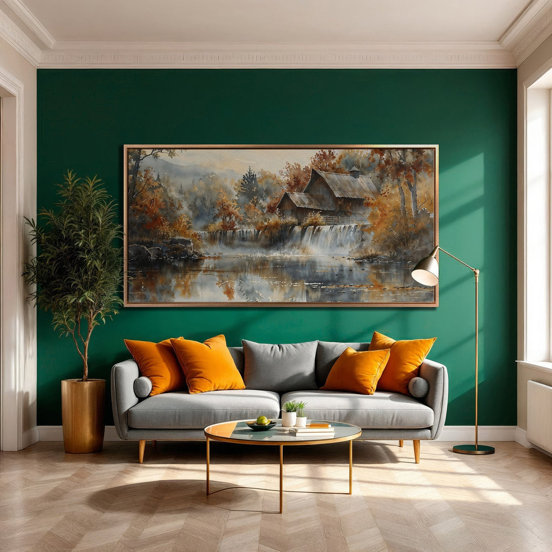 Framed Wall Art: Watercolor landscape Canvas Print with warm autumnal tones. Adds a cozy touch to any room. Features a waterfall and cabin.