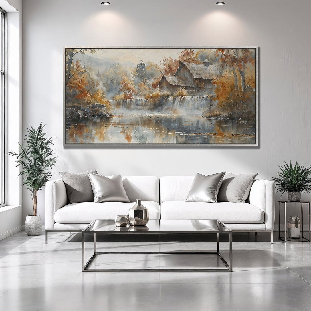 Framed Wall Art: Watercolor landscape of a waterfall and rustic buildings in warm autumn tones. Perfect for living room decor.