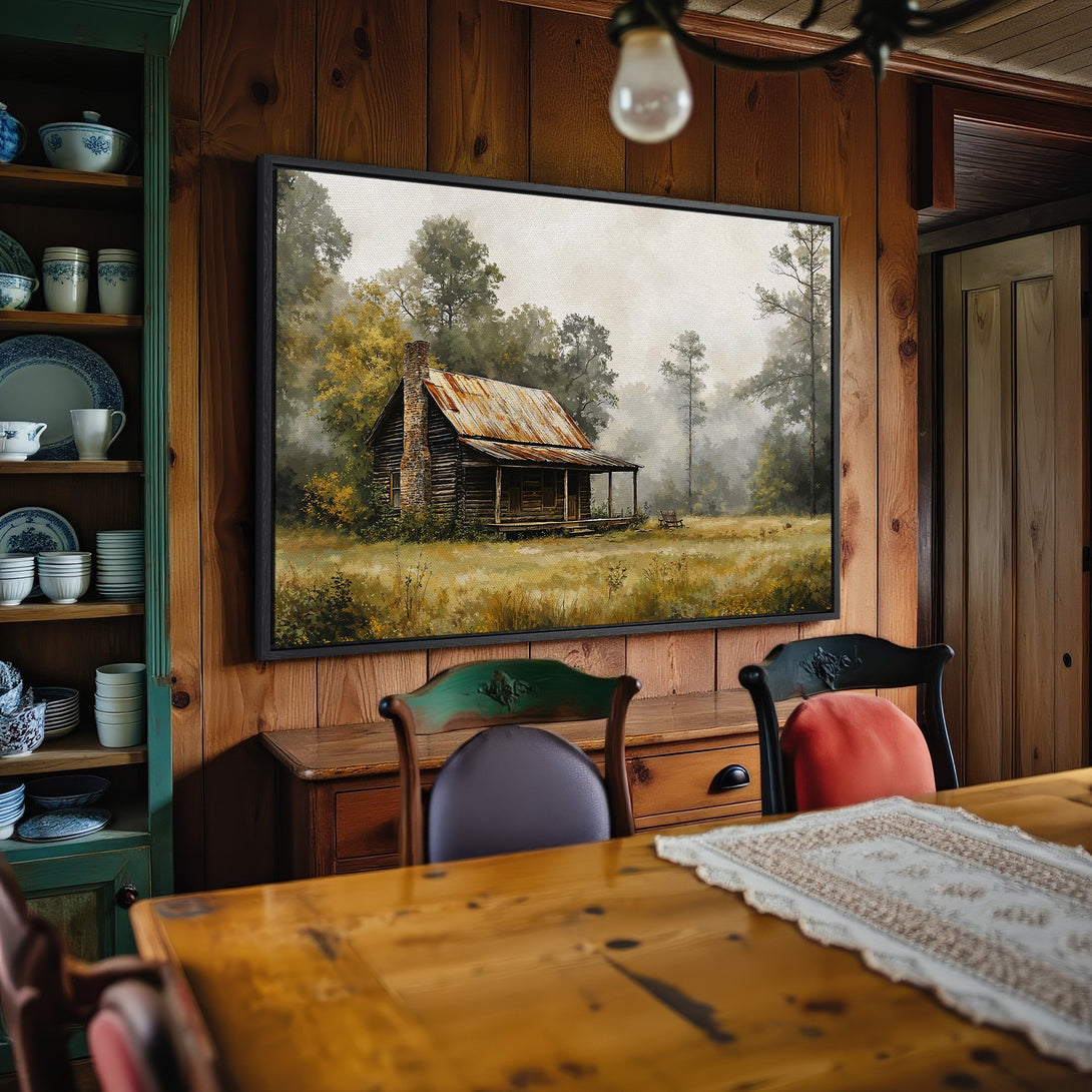 Framed Wall Art: Rustic cabin landscape painting in muted greens & browns. Perfect for farmhouse decor. Enhance your space with this canvas print!