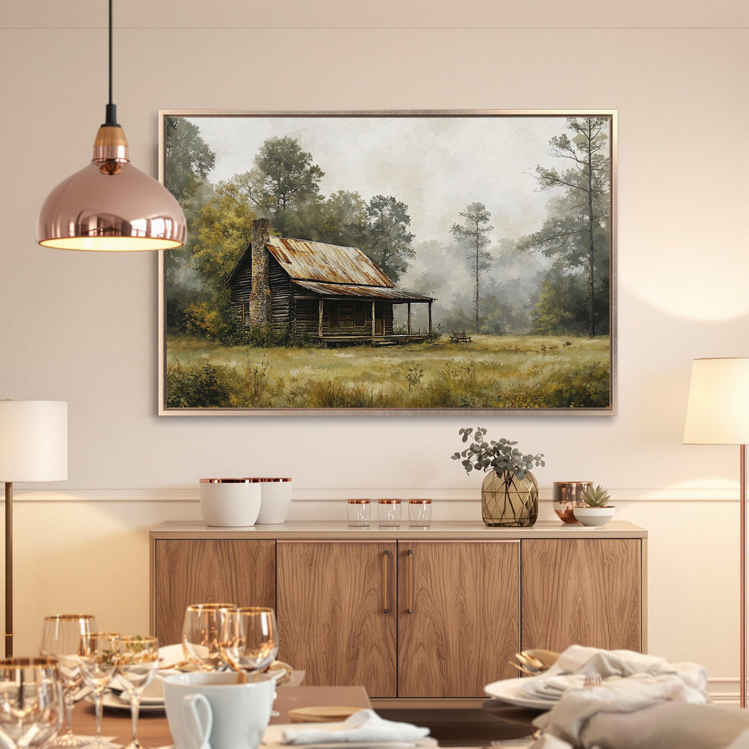 Framed Wall Art: Rustic cabin landscape in muted greens and golds. Add a touch of nature to your home with this beautiful canvas print.