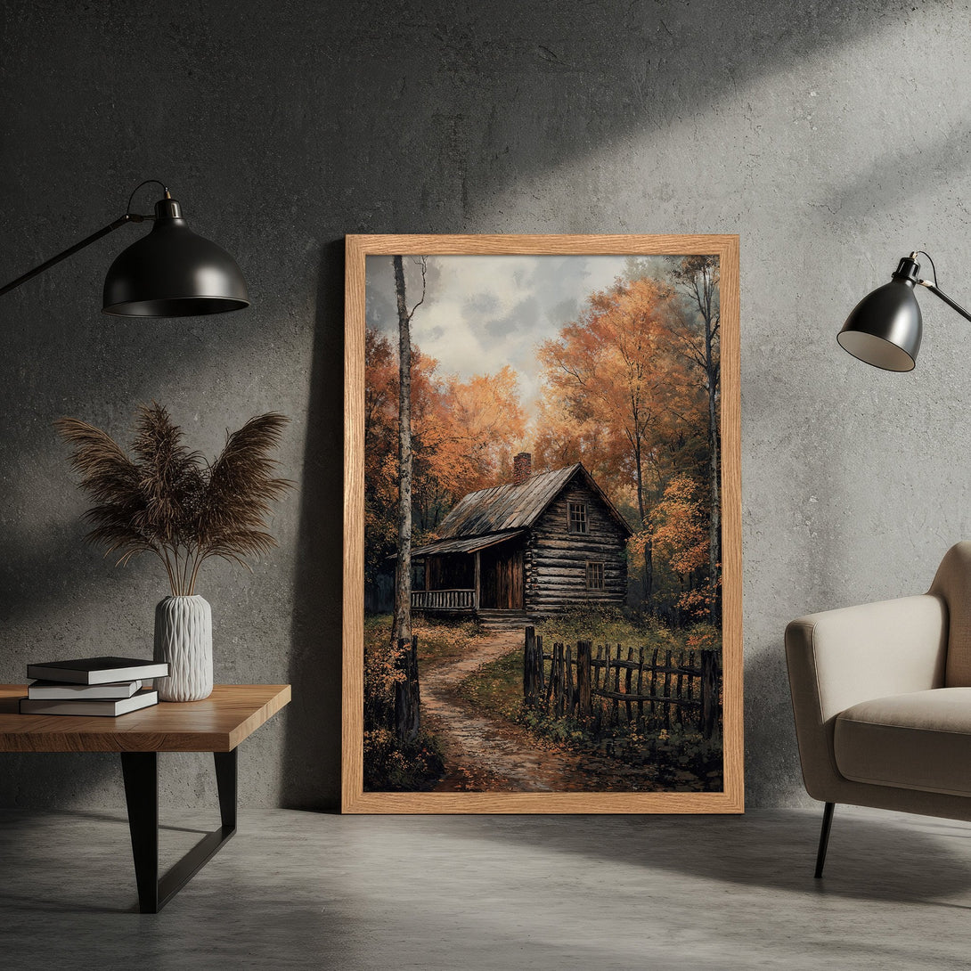 Framed Poster of a rustic cabin in autumn forest. Warm orange and brown color palette, perfect for cozy decor. Add a touch of nature to your space!