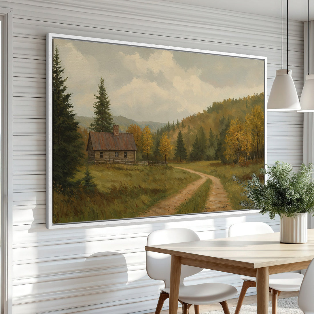 Framed Wall Art featuring a rustic cabin landscape painting in warm earth tones. Perfect for adding a cozy, vintage feel to your home decor.