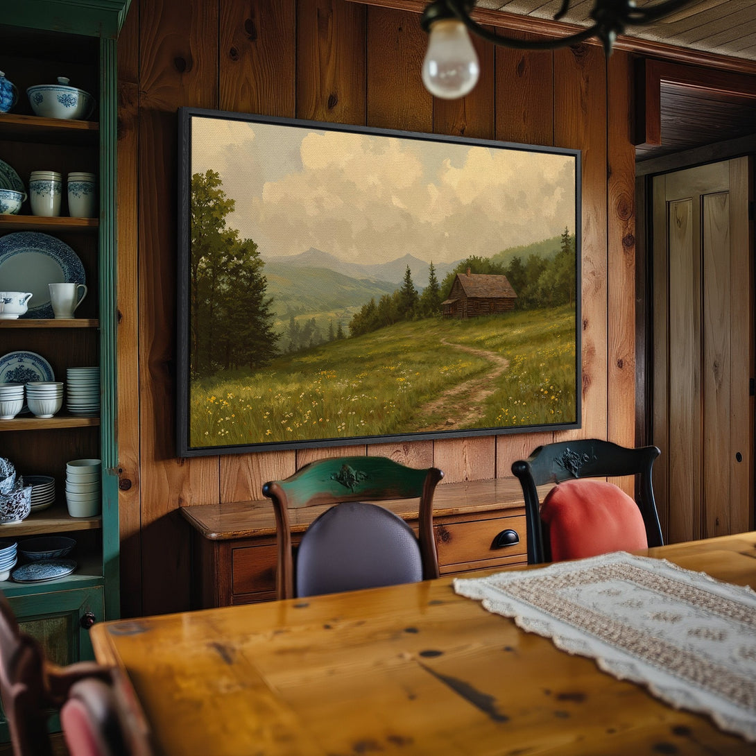 Framed Wall Art: Landscape Canvas Print with a cabin in a meadow, warm color palette, perfect for rustic home decor.