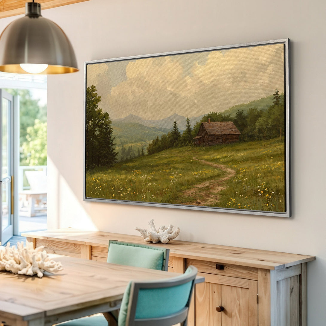 Framed Wall Art featuring a serene landscape painting with a cabin in a field. Warm, earthy tones create a cozy, rustic aesthetic. Perfect for home decor.