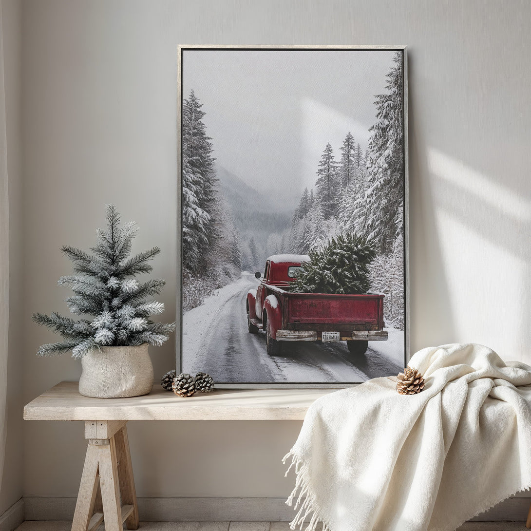 Framed Wall Art: Winter scene with red truck carrying Christmas tree. Rustic style, neutral & red color palette. Perfect holiday decor.