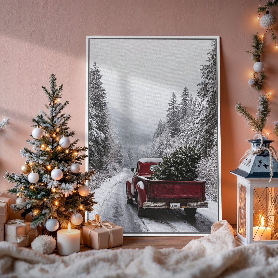 Framed Wall Art: Winter scene with red truck carrying Christmas tree. Rustic style, neutral & red color palette, perfect for holiday decor.