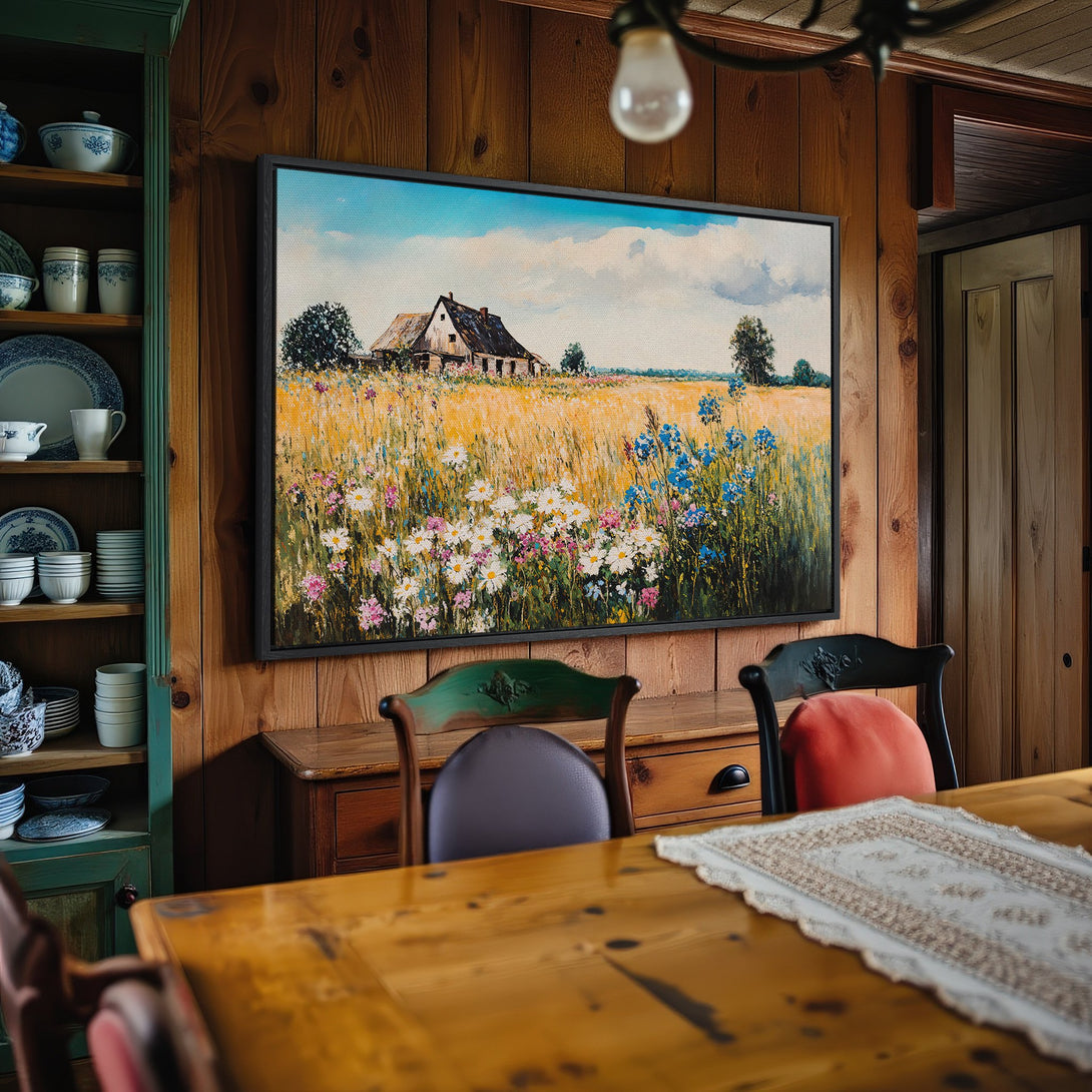 Framed Wall Art featuring a rustic landscape painting with a farmhouse, wildflowers, and a warm, inviting color palette. Perfect for any home!