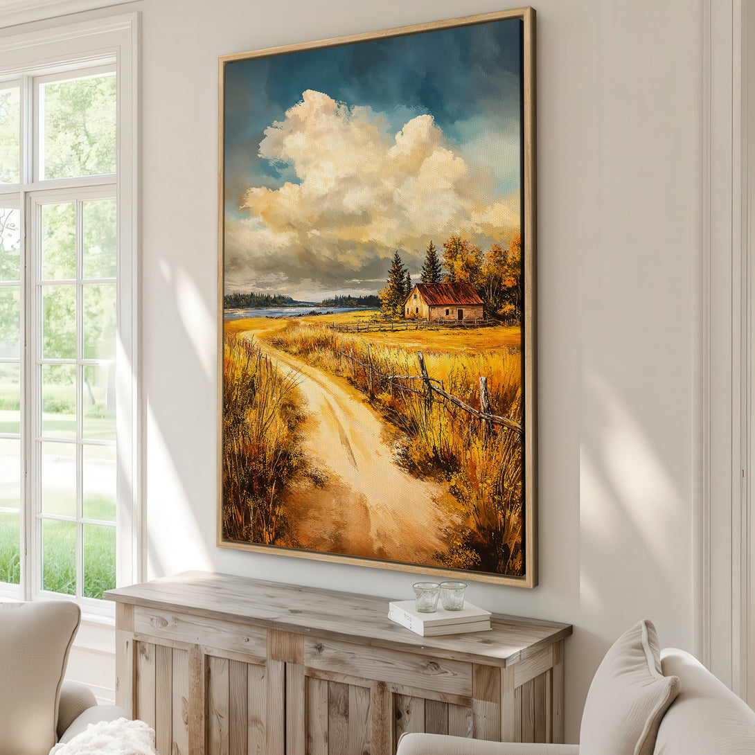Framed Wall Art Canvas Print of a serene landscape with a dirt road, farmhouse, and warm color palette. Perfect for rustic home decor.