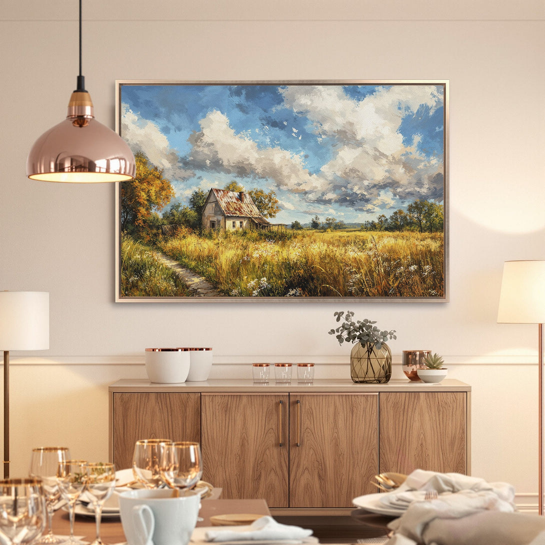 Framed Wall Art: Rustic landscape Canvas Print with a farmhouse and blue sky, warm color palette, perfect for your home decor.