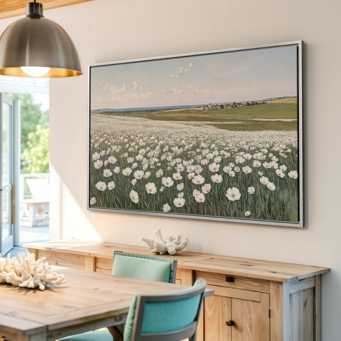 Framed Wall Art featuring a field of white flowers. Impressionistic style with a soft, natural color palette. Perfect for adding a touch of serenity to any room.