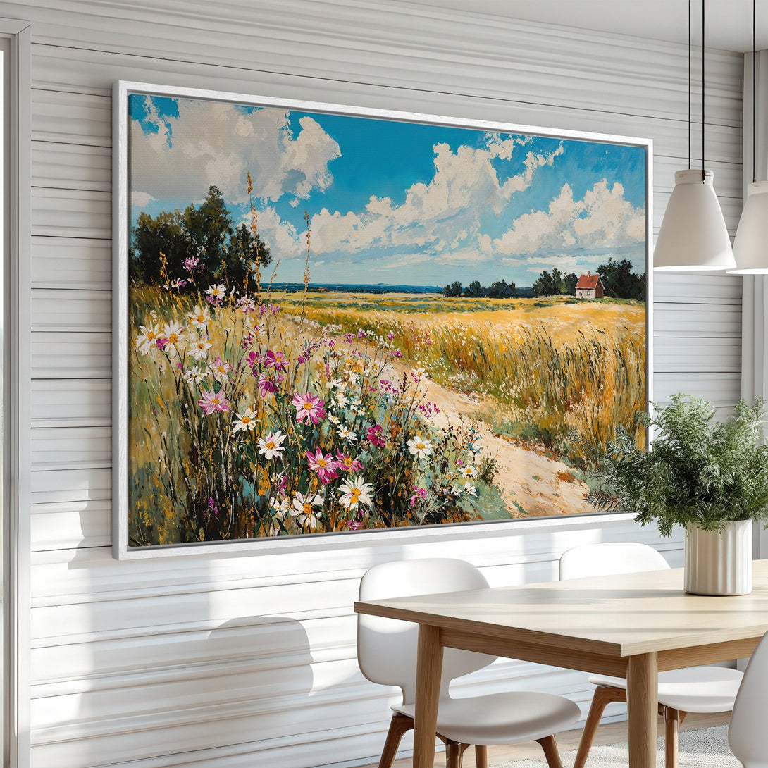 Framed Wall Art of a vibrant field landscape. Impressionistic style with wildflowers, blue sky, and warm color palette, perfect for home decor.