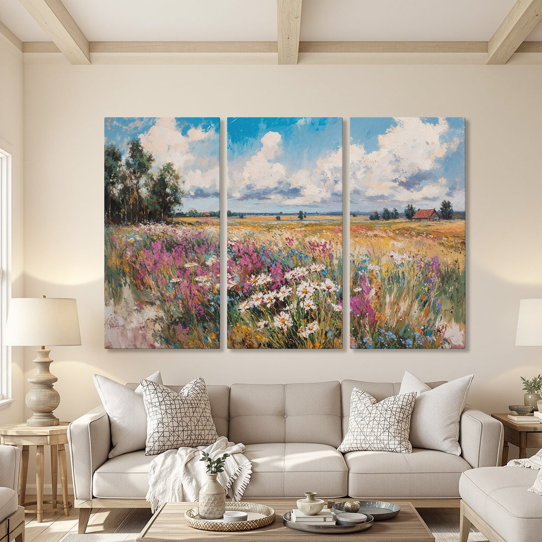 Canvas Print triptych of a vibrant wildflower meadow in an impressionistic style. Features a colorful palette of blues, pinks, and yellows. Perfect wall art!