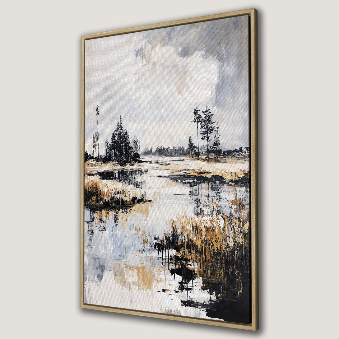 Framed Wall Art featuring an abstract landscape painting with neutral tones. Modern canvas print with a serene river scene in black, white, and gold.