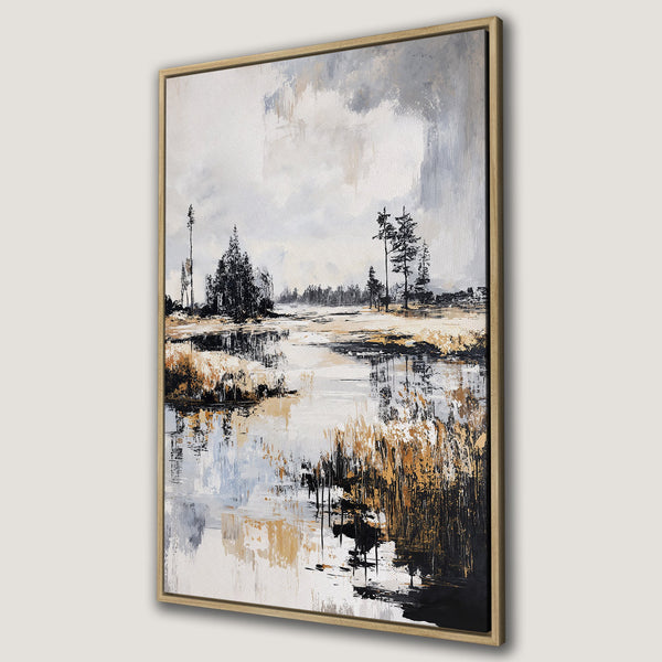 Framed Wall Art featuring an abstract landscape painting with neutral tones. Modern canvas print with a serene river scene in black, white, and gold.