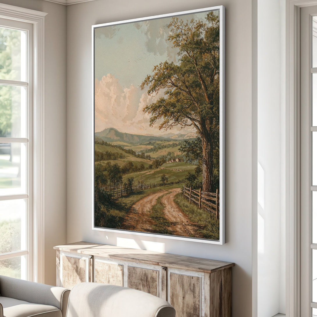 Framed Wall Art: Landscape Canvas Print with a vintage style, featuring a dirt road, trees, and rolling hills in a muted green and beige palette.