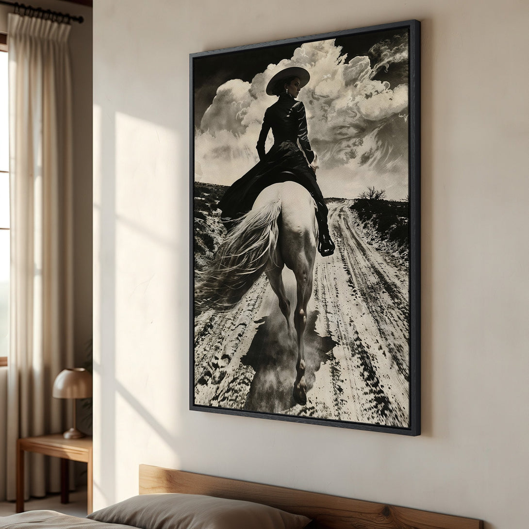Framed Wall Art of a cowgirl riding a horse in monochrome. Add a touch of western style to your home with this stunning Canvas Print.