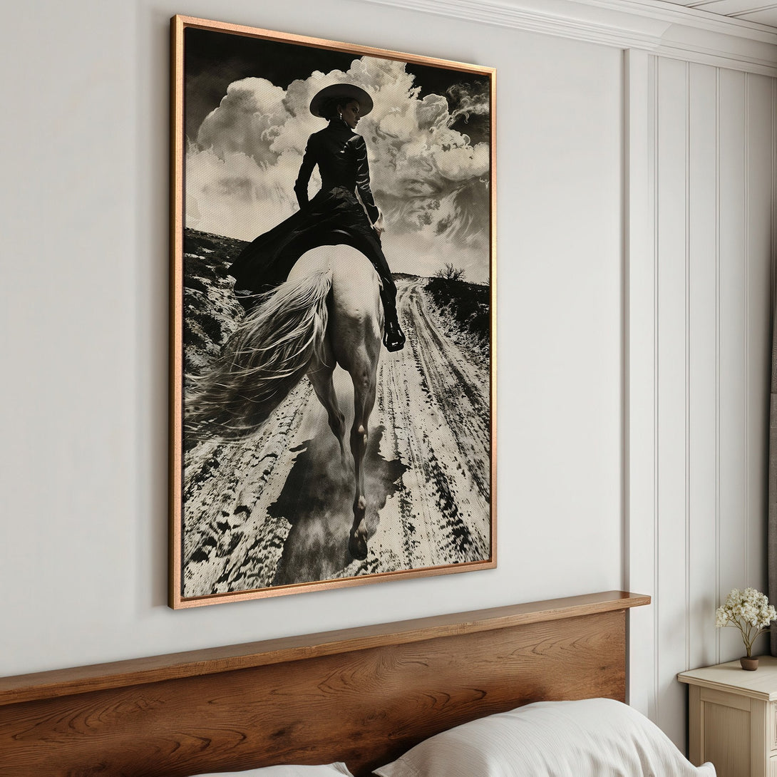 Framed Wall Art: Black & white canvas print of a woman on horseback, dramatic clouds. Rustic, vintage style. Perfect for bedroom decor.