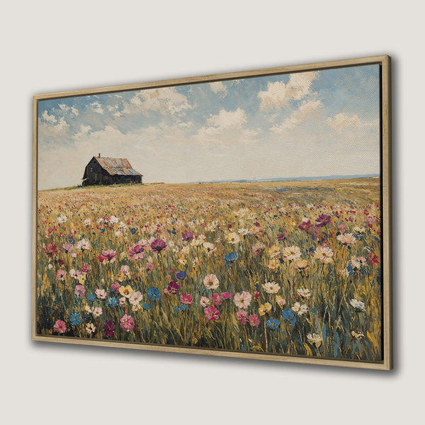 Framed Wall Art: Rustic landscape Canvas Print featuring a barn in a field of wildflowers. Warm, inviting color palette with blues, yellows, and pinks.