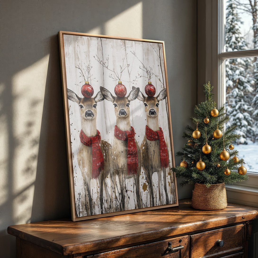 Framed Wall Art featuring watercolor deer with red scarves and ornaments. Rustic style, warm color palette, perfect for holiday decor.