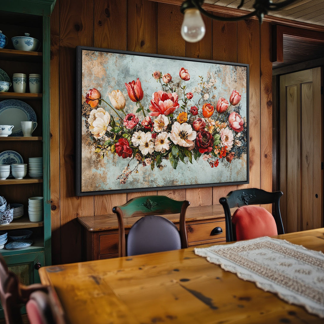 Framed Wall Art: Floral Canvas Print with vibrant red, orange, and white blooms against a muted blue background. Rustic style, perfect for adding warmth to any room.