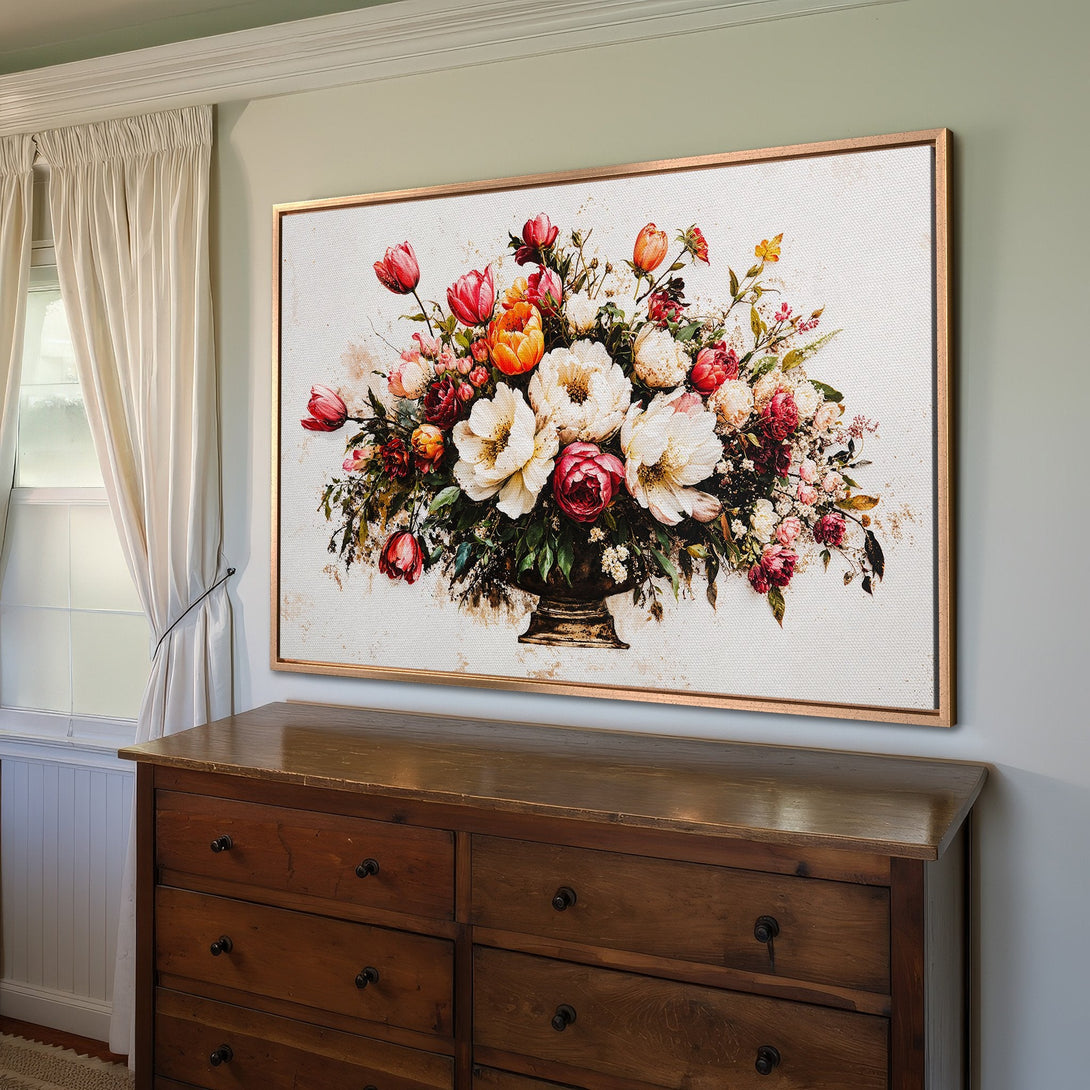 Framed Wall Art featuring a vibrant floral arrangement in a classic style, with a warm red, orange, and white color palette; perfect for home decor.