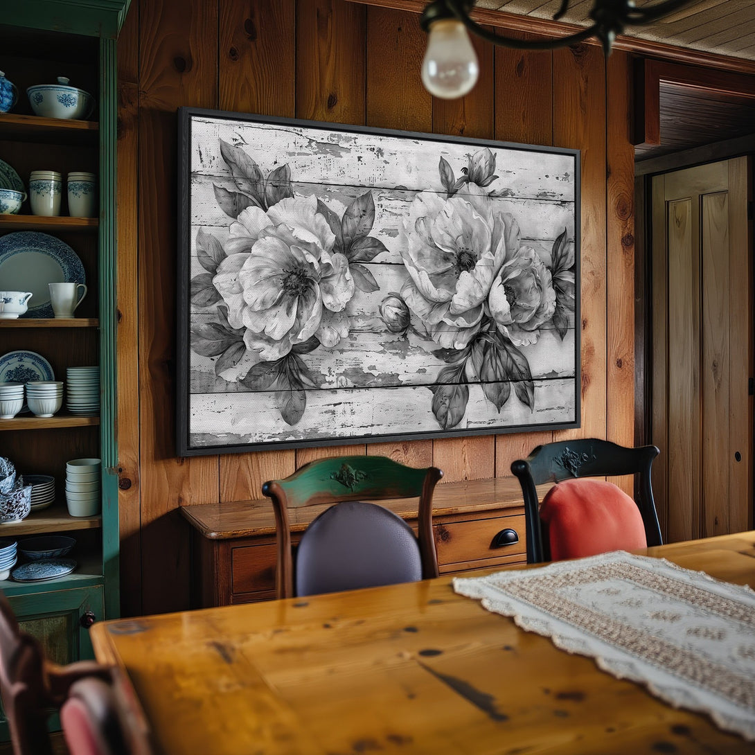 Framed Wall Art: Elegant black and white floral canvas print. Adds a touch of rustic charm to any space. Perfect for farmhouse decor.