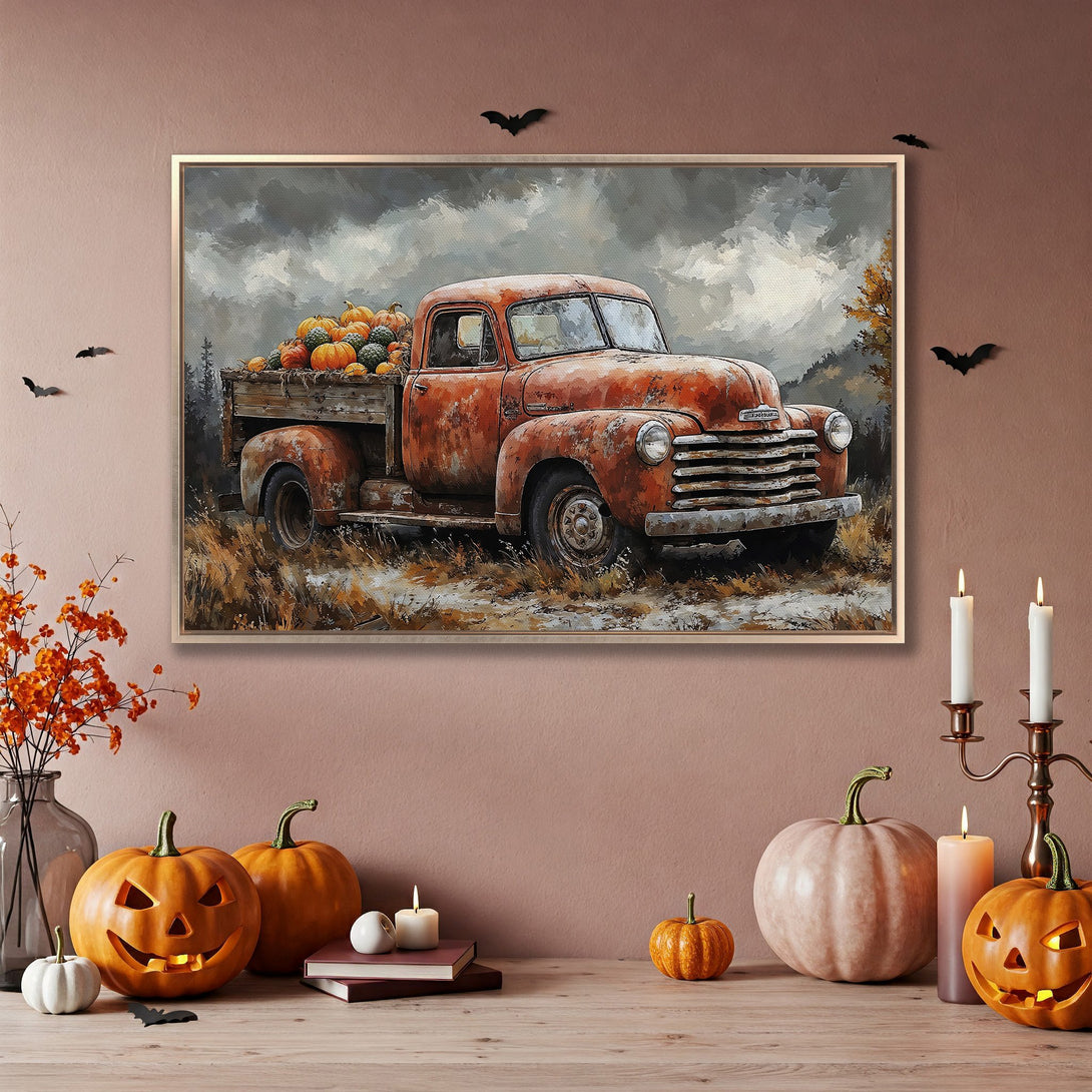 Framed Wall Art: Rustic truck loaded with pumpkins. Autumnal painting in warm orange and grey tones, perfect for fall decor.