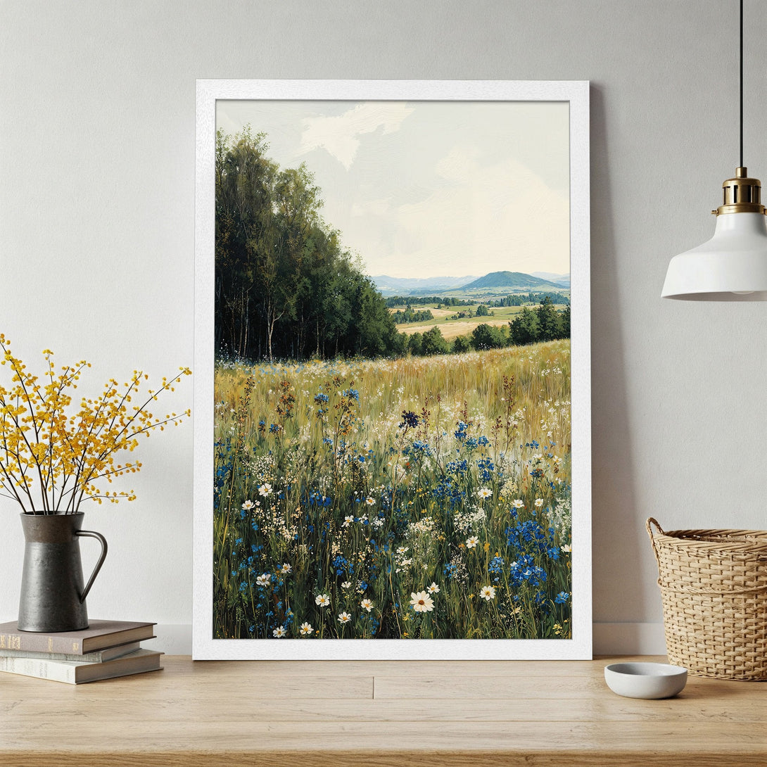 Framed Poster featuring a serene meadow landscape in a painterly style with a natural color palette of greens, blues, and yellows.