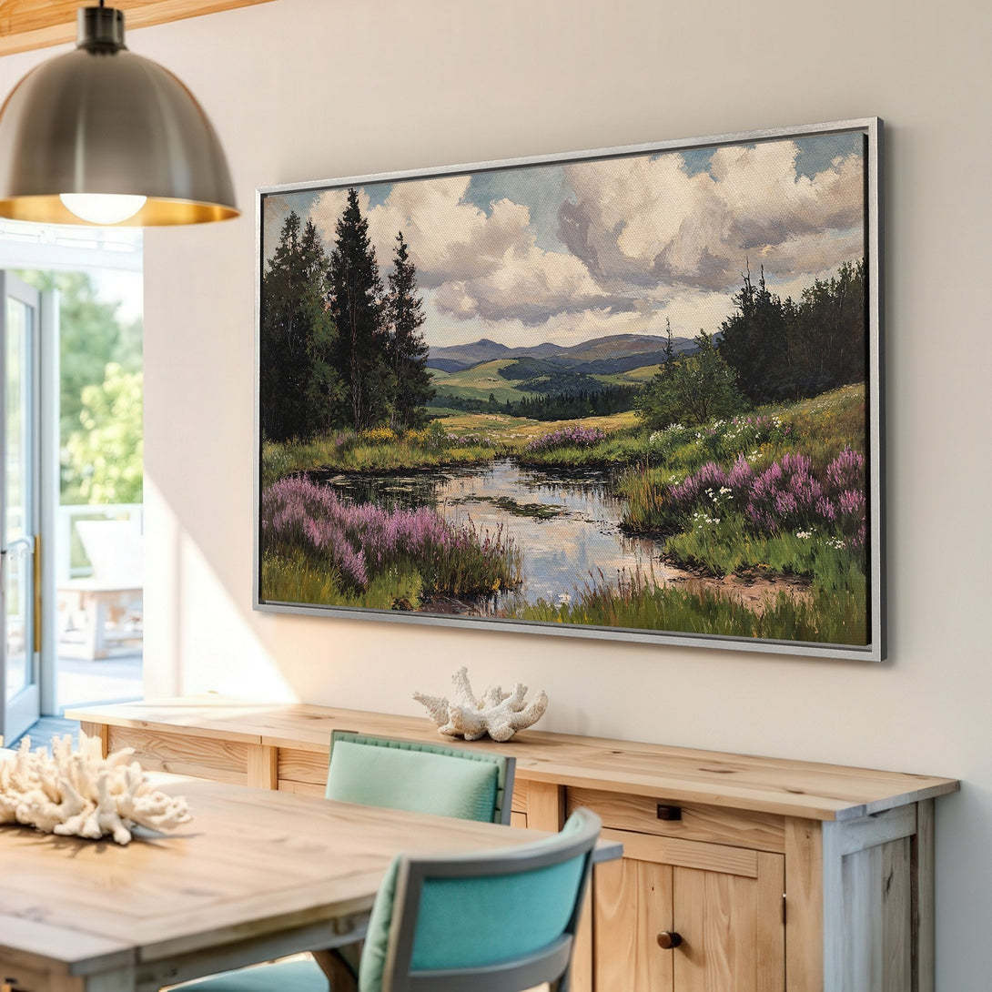 Framed Wall Art: Landscape painting with a serene river scene, featuring purple flowers and green foliage, in a neutral color palette. Perfect for home decor.