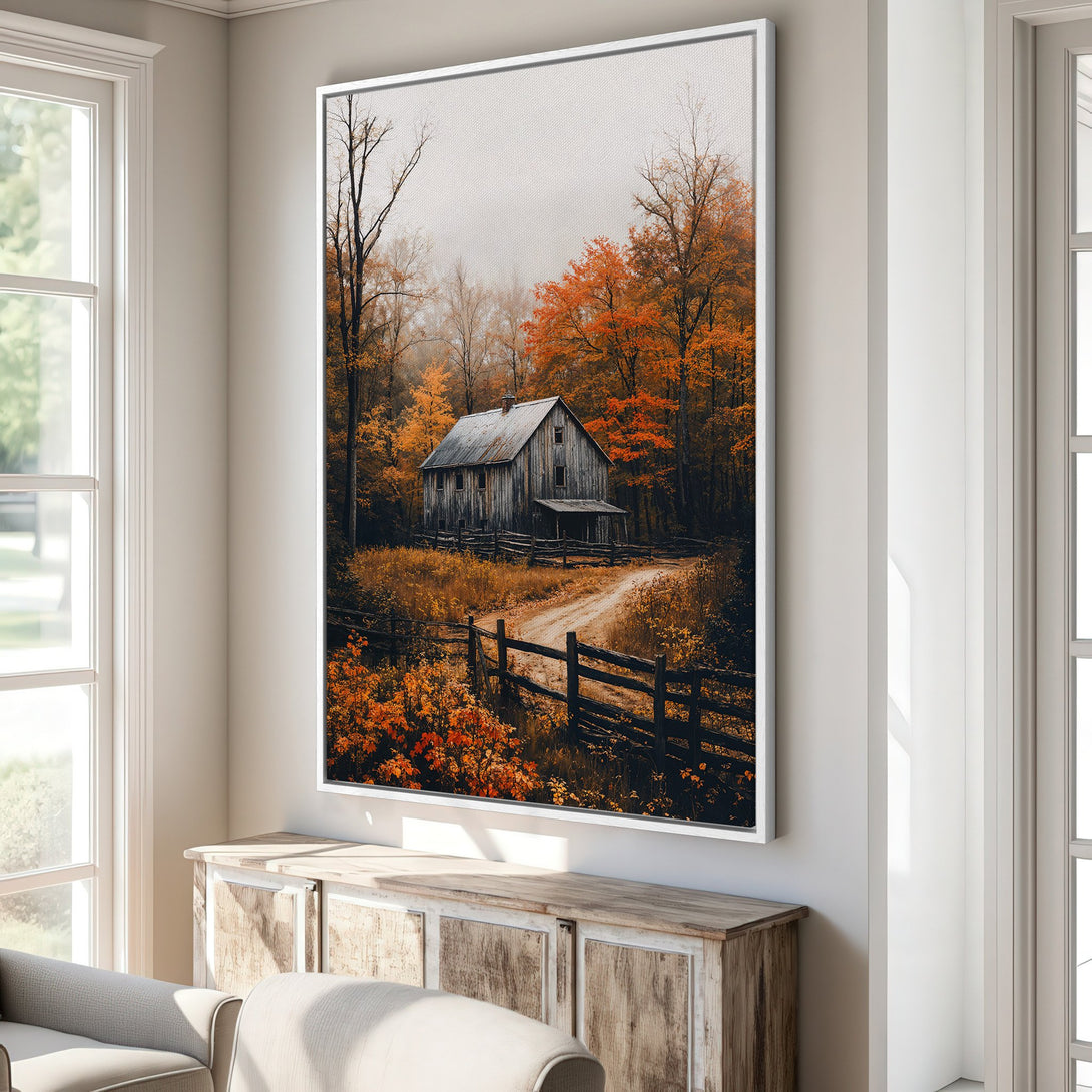 Framed Wall Art featuring a rustic barn scene in autumn. Warm orange and brown tones create a cozy, inviting atmosphere. Perfect for adding a touch of nature to your home.