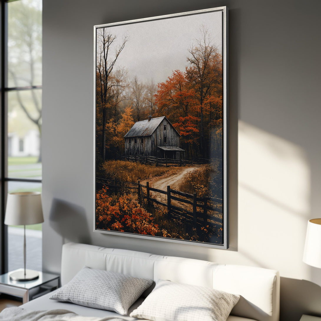 Framed Wall Art featuring a rustic barn scene in autumn colors. Warm orange, brown, and gray tones create a cozy, inviting atmosphere for your home.