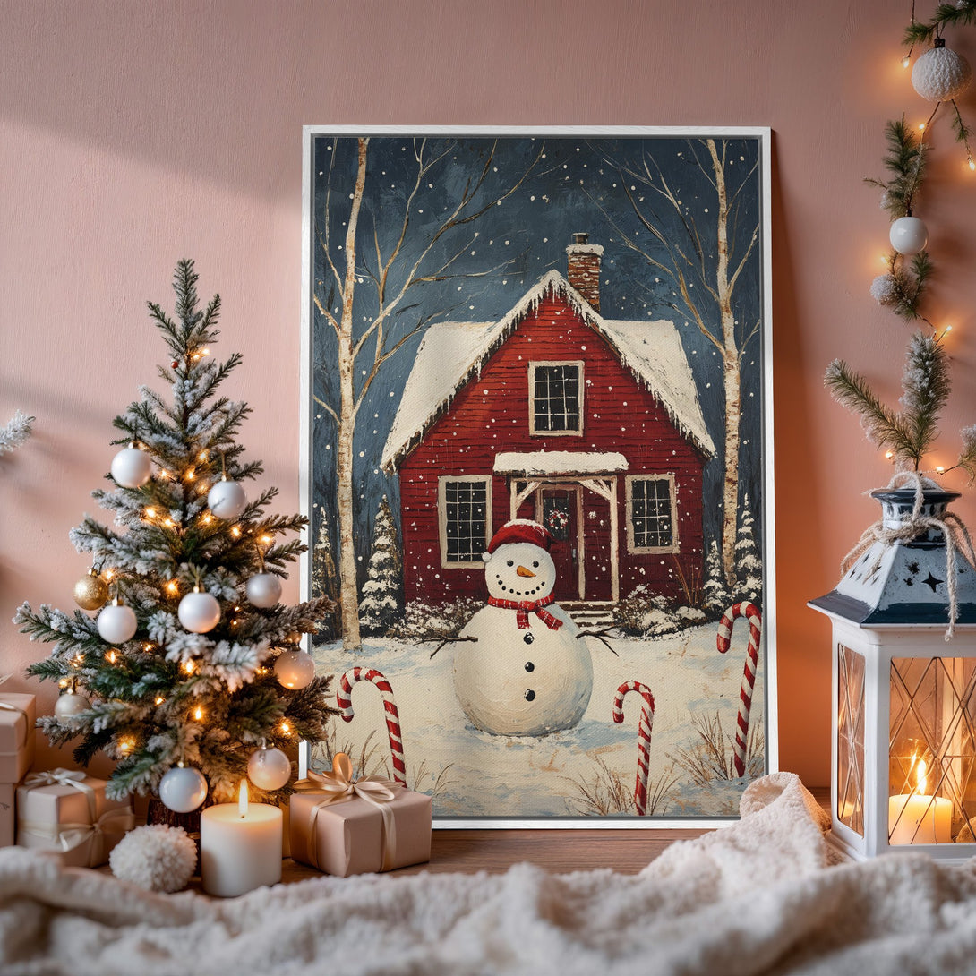 Framed Wall Art: Winter scene with a red house and snowman. Cozy, festive painting with a blue, red, and white color palette, perfect for holiday decor.
