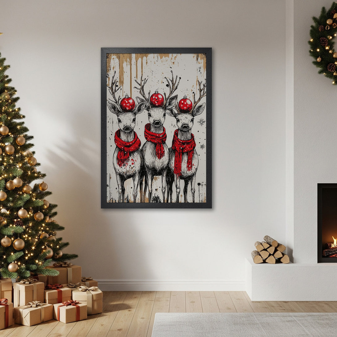 Framed Poster featuring three deer with red scarves and ornaments, winter art in black, white, and red color palette.